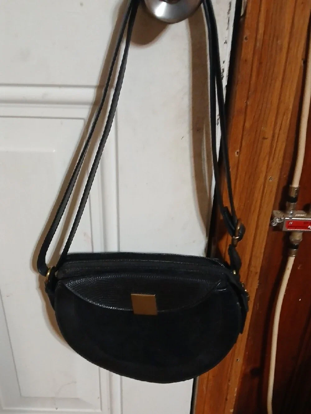 Black Semi-Circle Crossbody Bag with Gold Accent